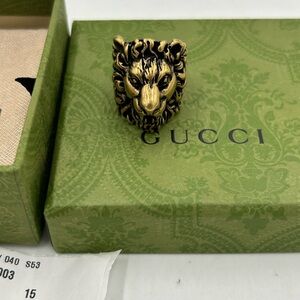 Gucci iconic lion head ring crafted from gold tone brass antique finish size 7